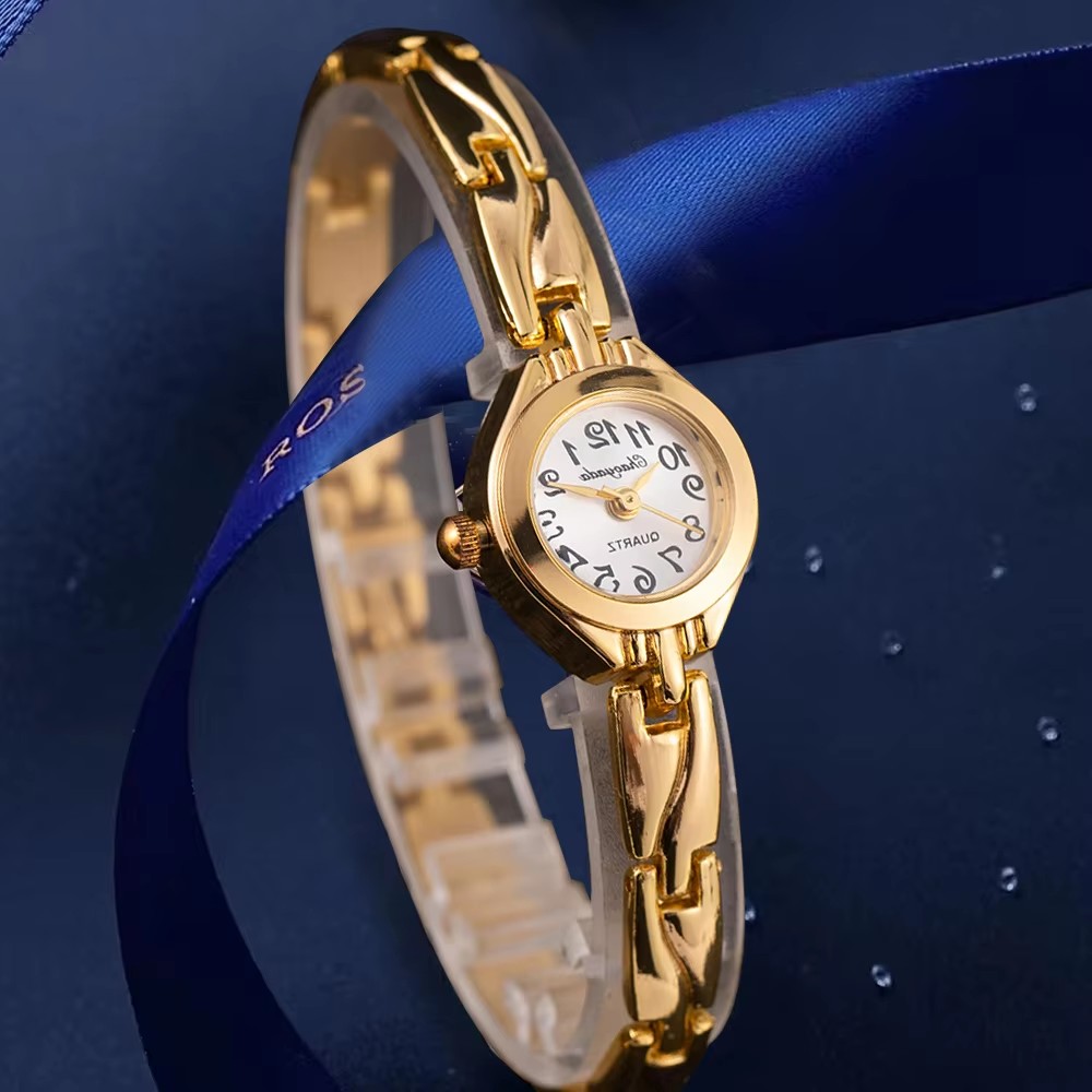 ساعة يد نسائية أنيقة بتصميم عص - مراجعة Luxury Watch Gold وسعره